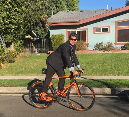 Bradley Gage riding a bicycle